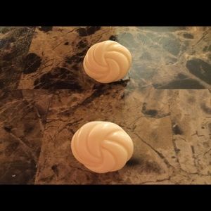 Ivory color swirl clip earrings